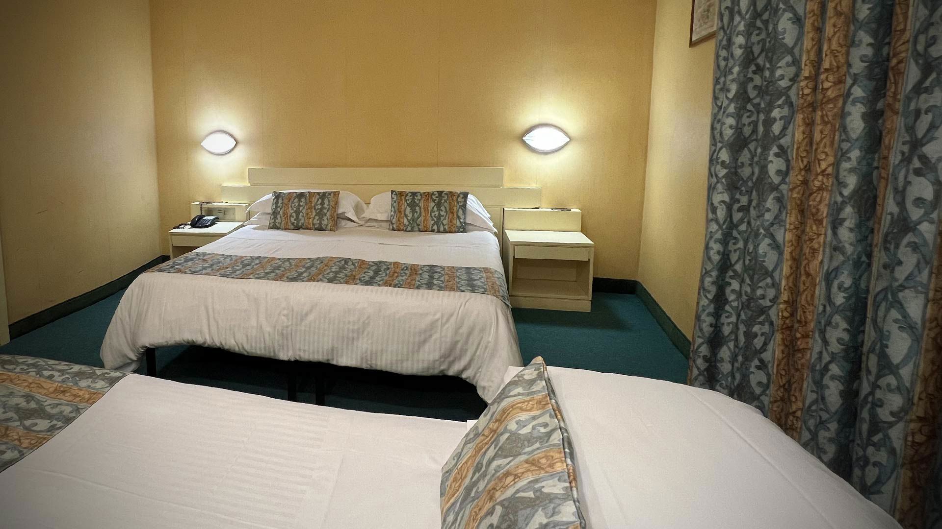 Descubra la habitación Triple Standard del Hotel Patria de Roma