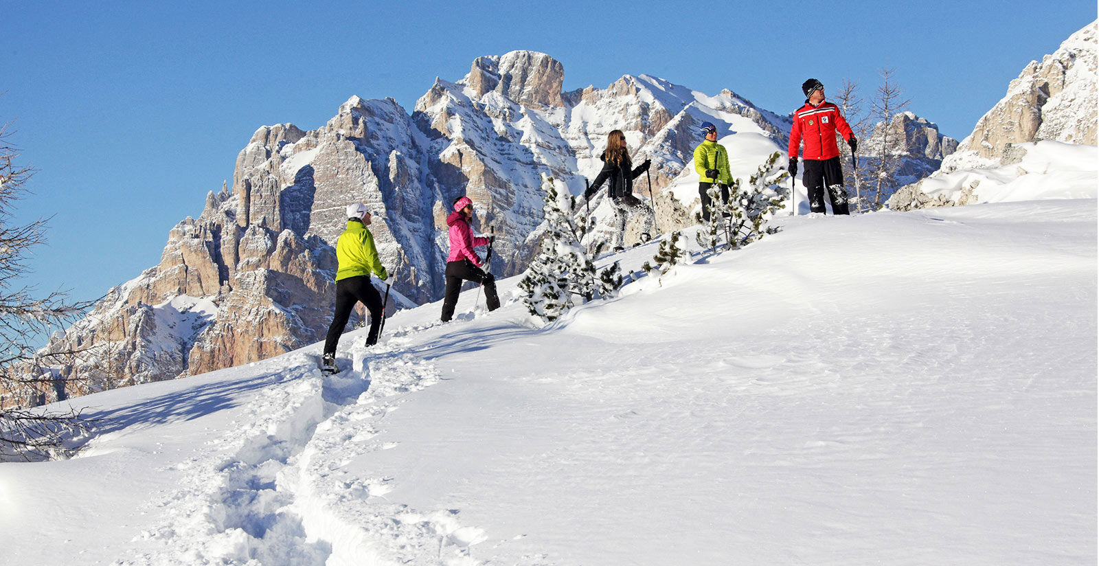 Wintertime hiking and bobsledding <br>in Alta Badia