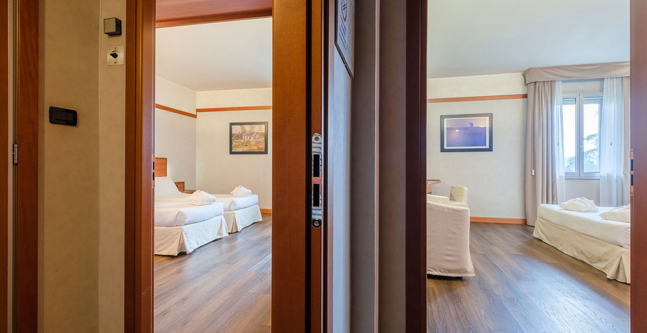 Book a family room at the SHG Hotel Bologna in Zola Predosa